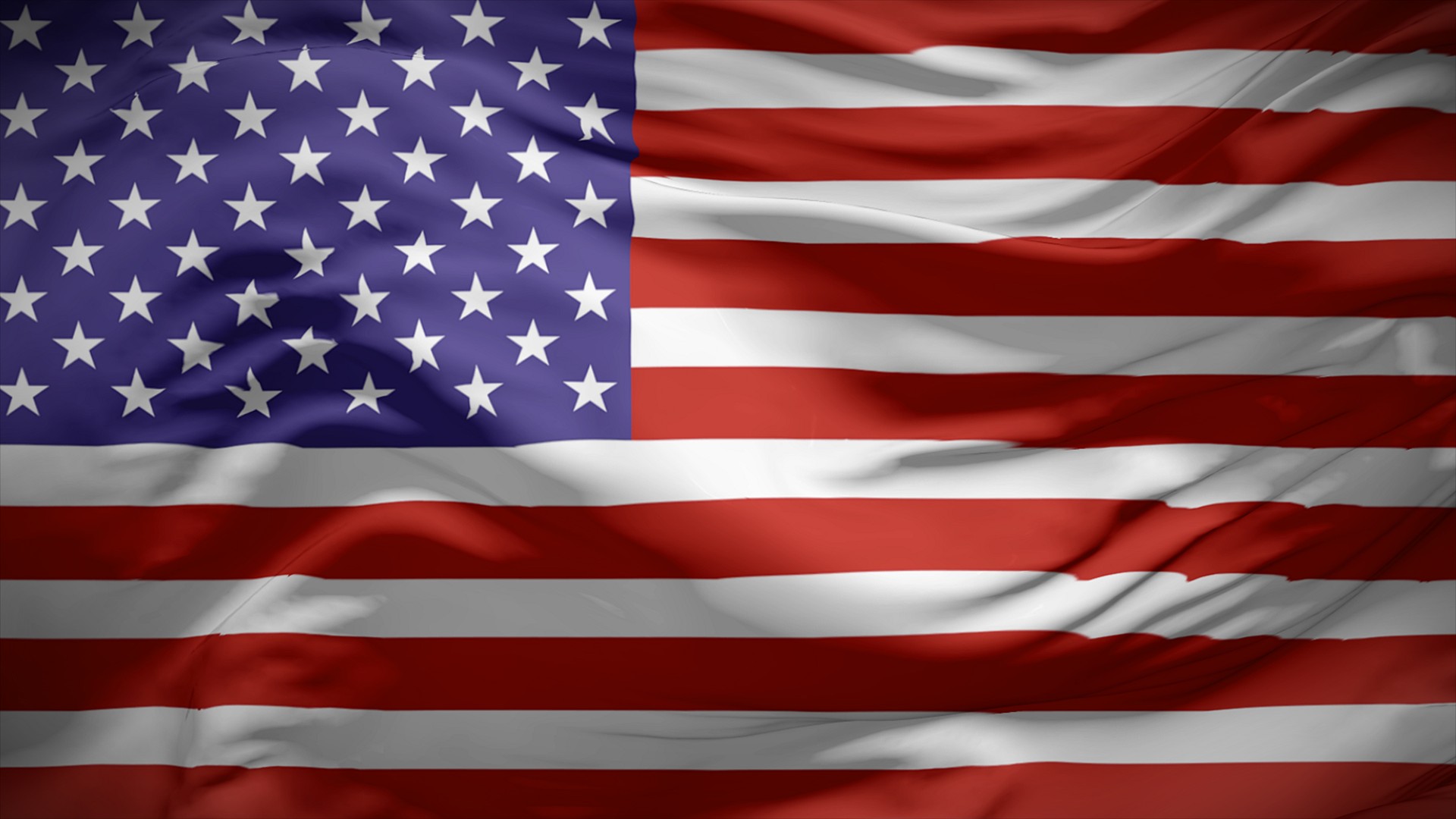 Close-up view of America National flag waving in the wind.